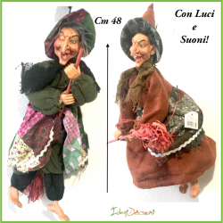 Befana musicale  suoni e luci statua con scopa cm 48