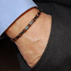 Bracciale da uomo in pietra ematite e inserti ramati